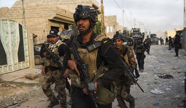  تحرير حي الاخاء الثانية بالموصل ورفع العلم العراقي فوقه 