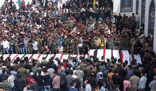 بالصور .. تشييع مهيب لعشرات الشهداء من بلدتي الفوعة وكفريا في منطقة الزينبية