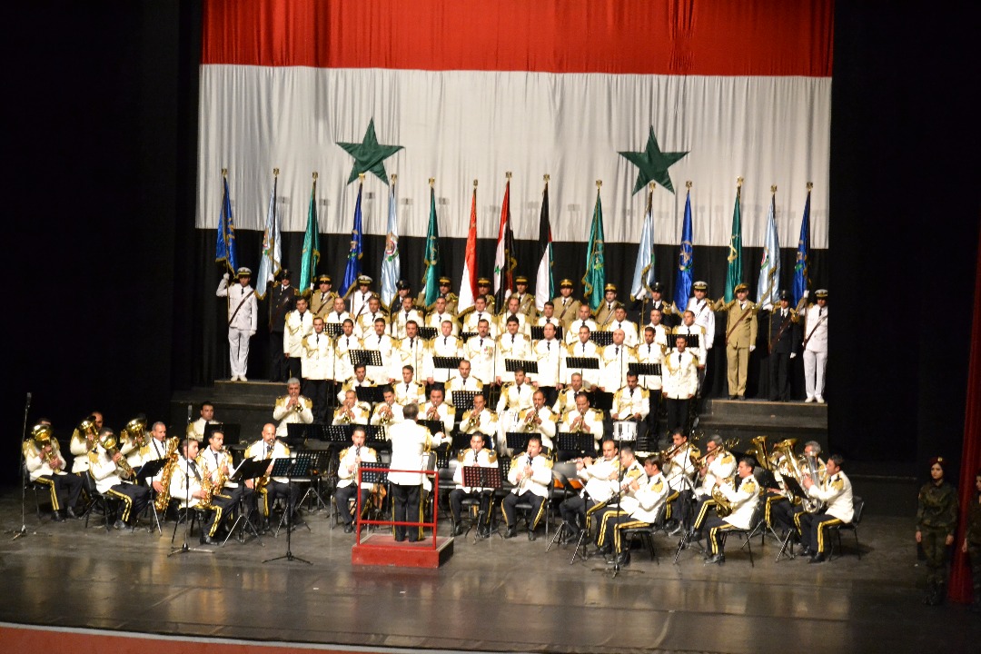  بالصور  جامعة دمشق تكرم الشهداء