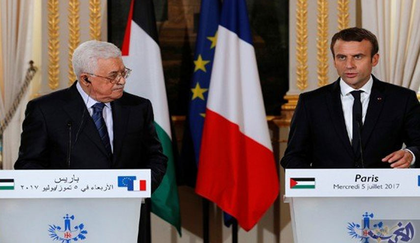 ماكرون وعباس يؤكدان تمسك فرنسا وفلسطين بـ"حل الدولتين"