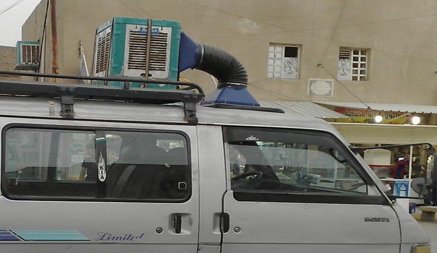 شاهد بالصور .. ابتكار عراقي "فريد" لشرب الماء البارد في السيارات