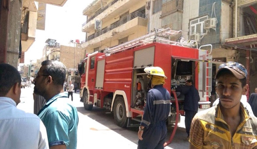 الحر أم الكهرباء وراء حريق داخل معمل وسط بغداد