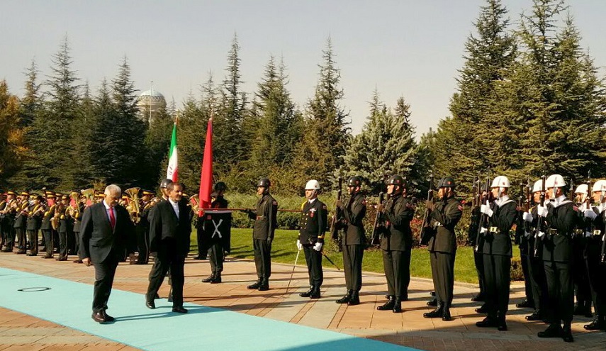 رئيس وزراء تركيا يستقبل جهانغيري رسميا في أنقرة