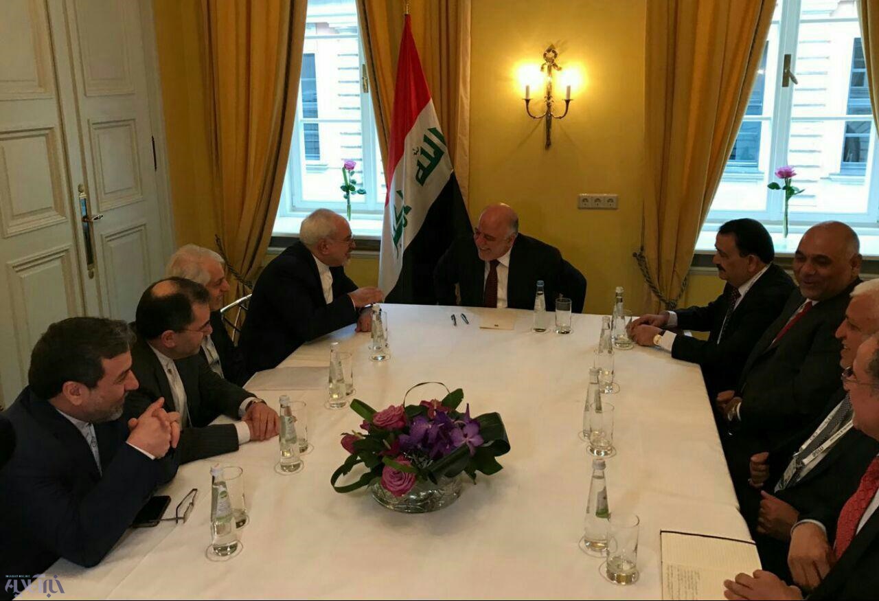 ظريف للعبادي: إيران لن توفر جهدا في التعاون وإعادة إعمار العراق