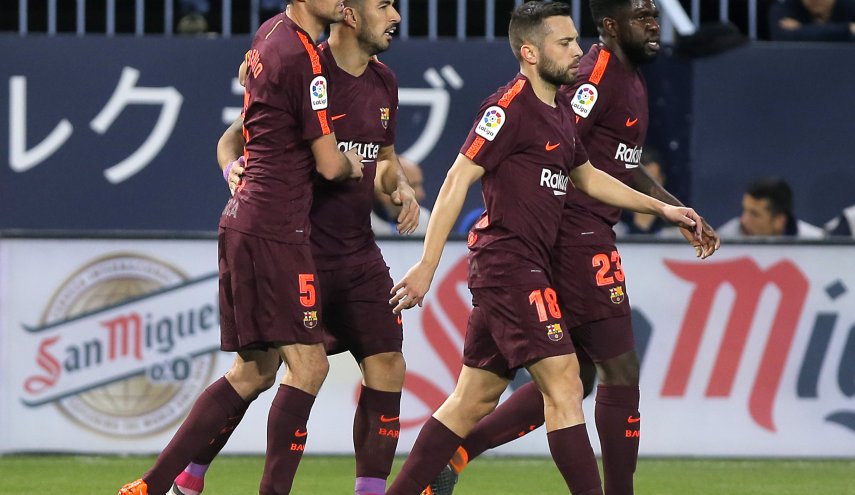 برشلونة يبتعد بالصدارة بثنائية في شباك ملقة