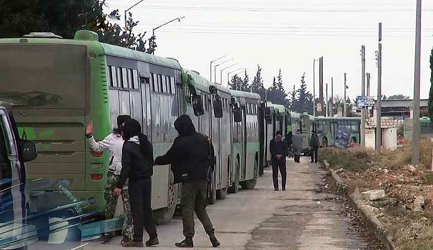بعيدا عن الاضواء.. خروج مسلحين من حي القدم الى ادلب