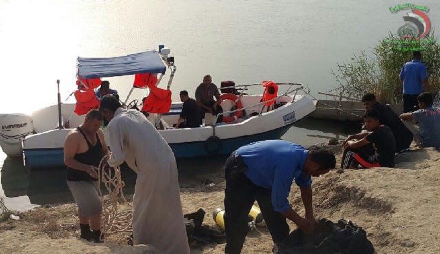  بالصور..انتشال جثتين لصبي وشاب من نهر الفرات