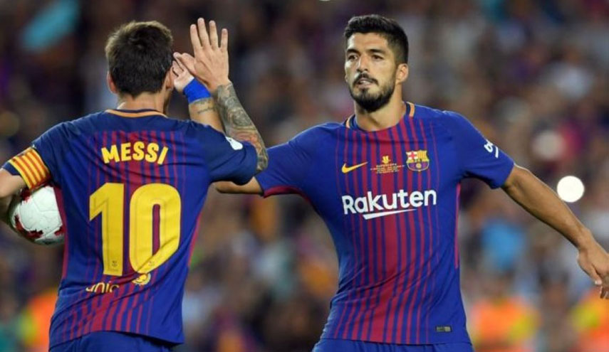 سواريز وميسي ينقذان برشلونة من مخالب إشبيلية في الليغا الاسبانية