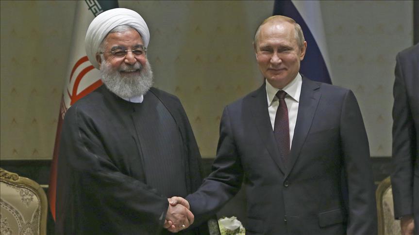 چهره هاي خندان پوتين و روحاني 