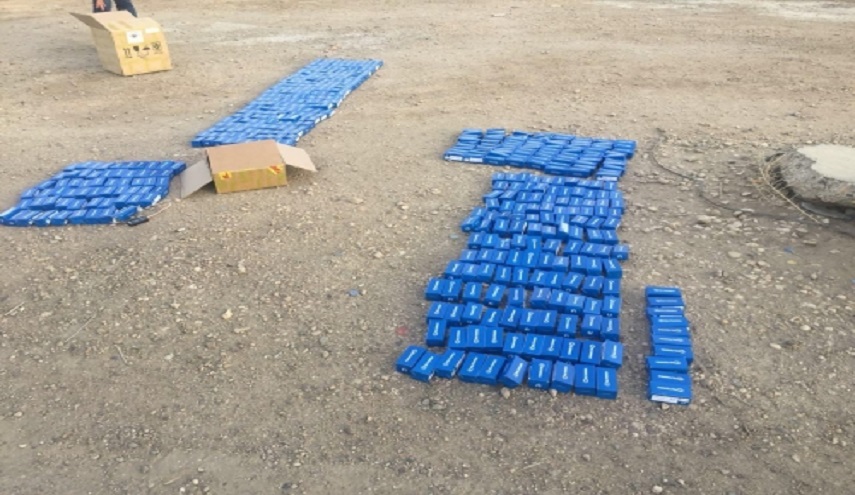  بالصور.. ضبط أجهزة إرسال وتتبع بمطار بغداد