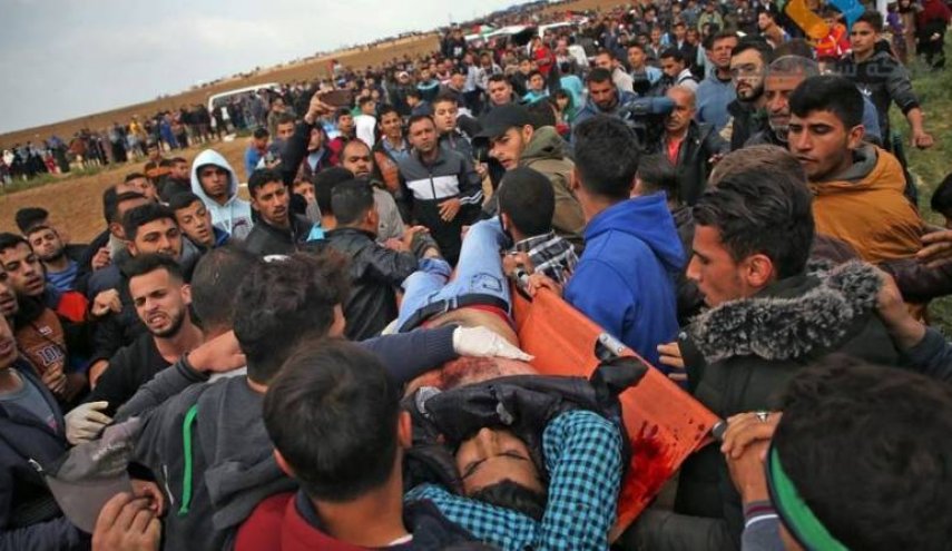  مشاركة الآلاف في مسيرة "الوفاء للجرحى" على حدود غزة 