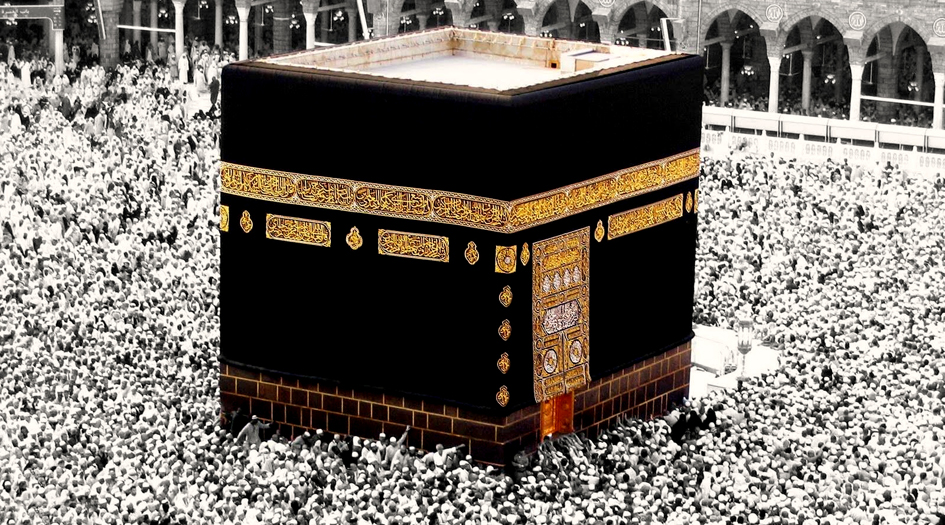 كعبه مشرفه ردائي نو برتن كرد +عكس