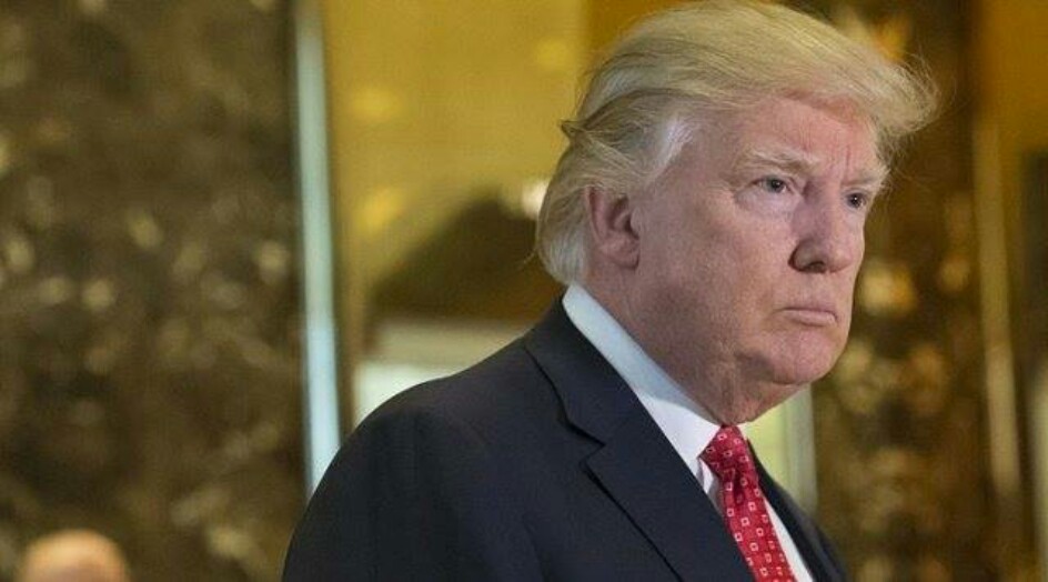 "التايم" الأمريكية تنشر صورة لترامب وهو يغرق