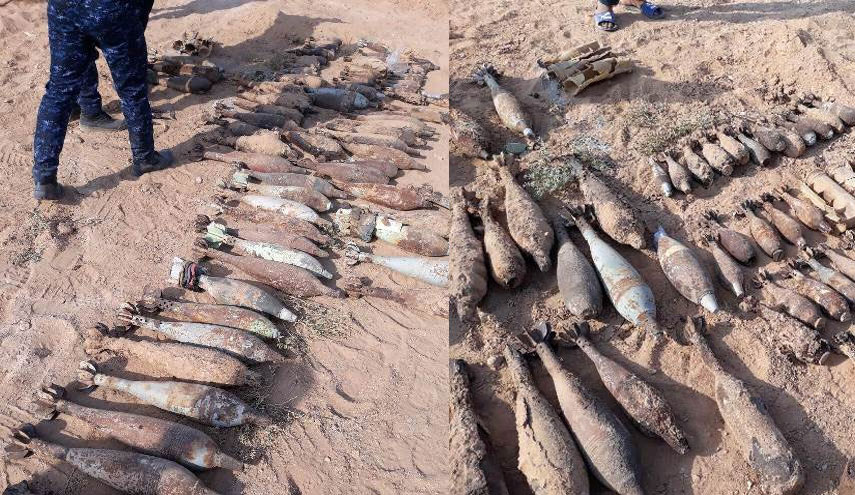 بالصور.. ١١٢ مقذوف حربي ترفع من صحراء كربلاء