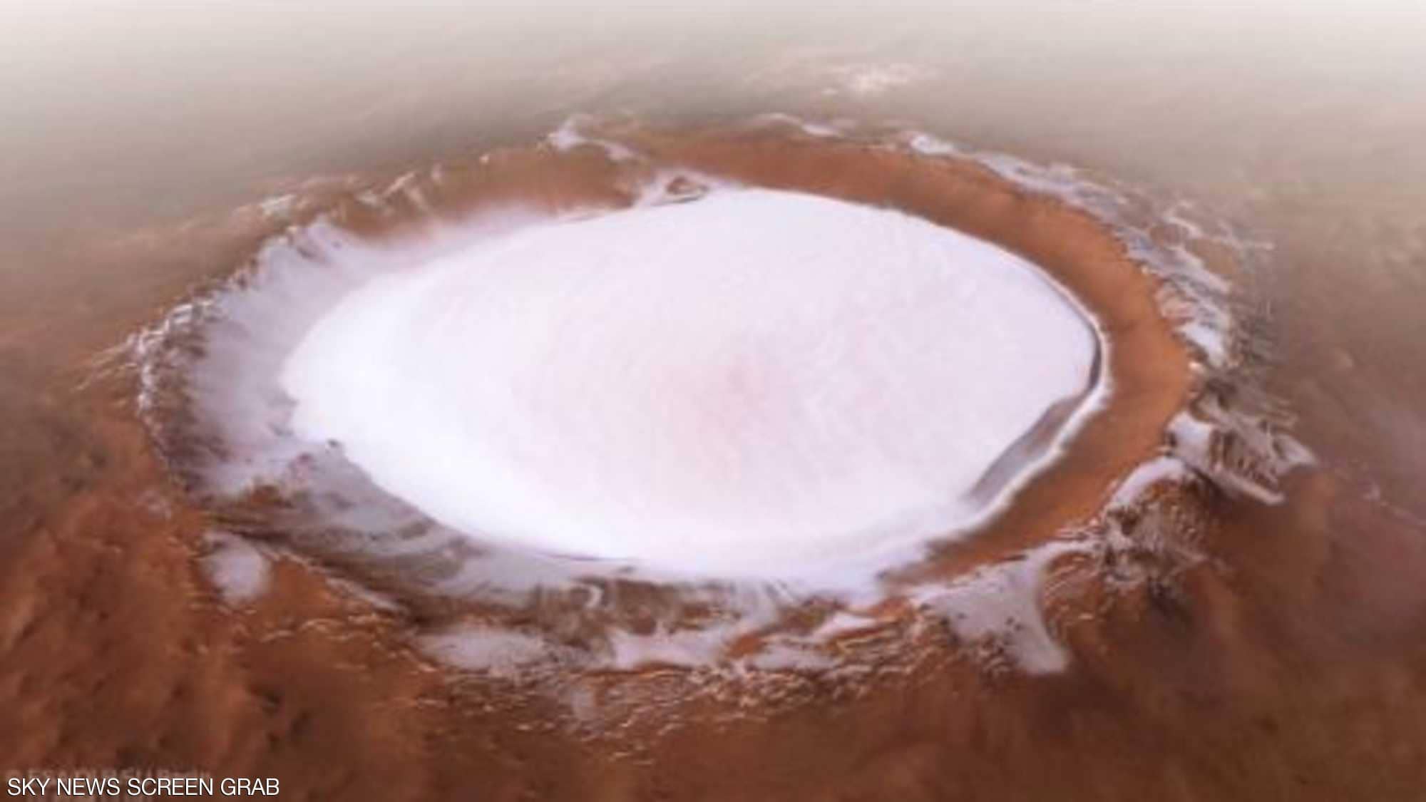  صور مذهلة من المريخ.. فوهة بركان مغطاة بالجليد