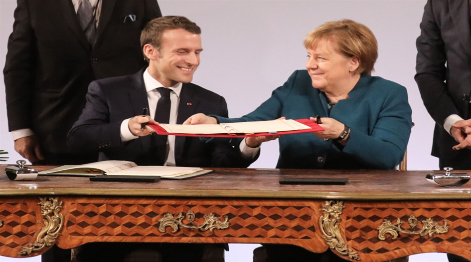 ماكرون وميركل يتطلعان إلى جيش أوروبي