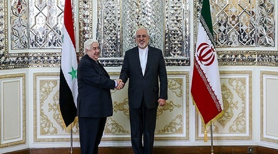 ظريف: الشركات الايرانية على استعداد للمشاركة في اعادة اعمار سوريا