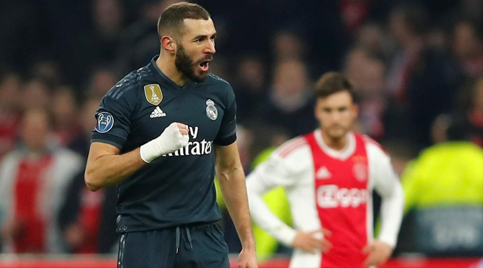 الملكي يفلت من كمين أياكس بثنائية رائعة