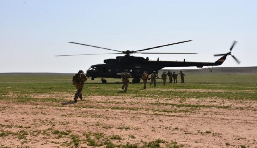 بالصور.. القبض على ارهابيين بانزال جوي في وادي الغدف بصحراء الانبار