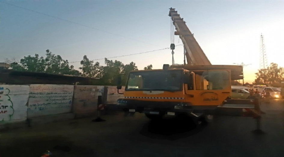 رفع الكتل الكونكريتية عن سوق شعبي في مدينة الصدر