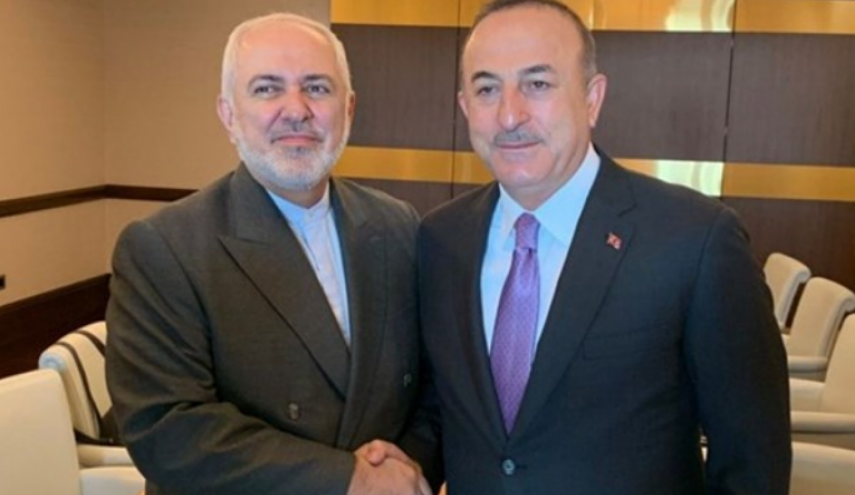 ظريف يبحث واوغلو العلاقات الثنائية وتطورات شمال سوريا