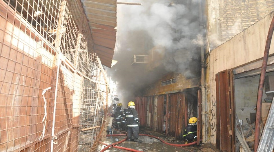 بالصور...حريق في السنك وسط بغداد