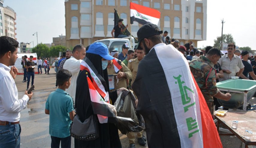 متظاهرو النجف: أي شخص خارج ساحة الاعتصام لا يمثلنا