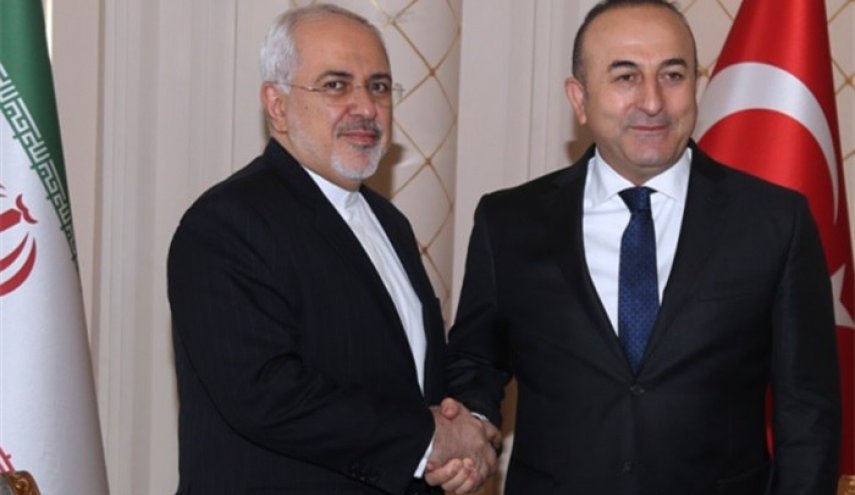 ظريف وأوغلو يبحثان القضايا الاقليمية بما فيها سوريا