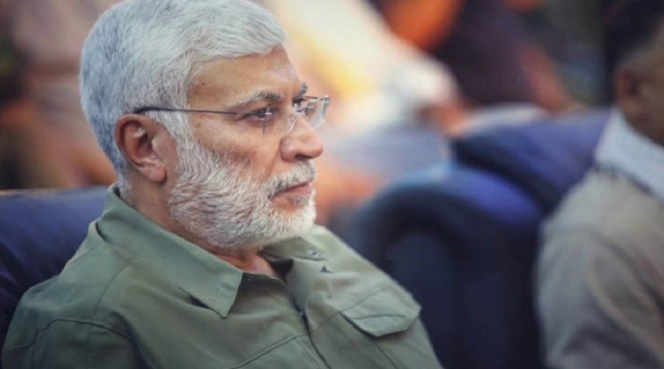 بالصور... أكبر جدارية في مطار بغداد الدولي بصورة الشهيد المهندس