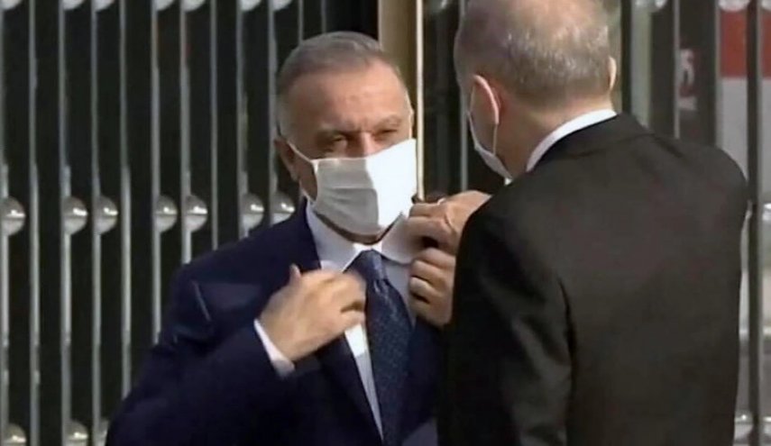 الكاظمي يعلق على لقطة تعديل قميصه من قبل أردوغان