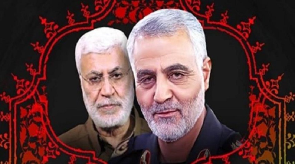 بالصور.. في ذكراهما الأولى.. الشهيد سليماني والشهيد المهندس في صور كبيرة بشوارع بغداد