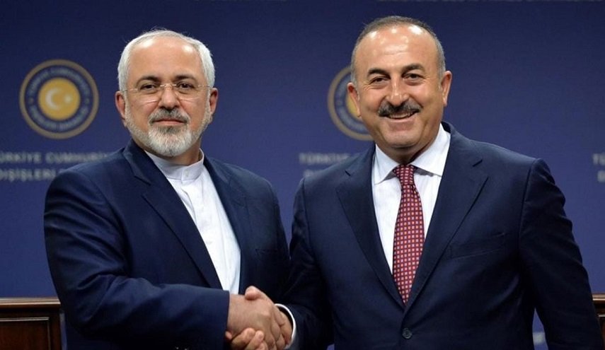 ظريف وأوغلو يعلنان عن عقد قمة ثلاثية قريبا